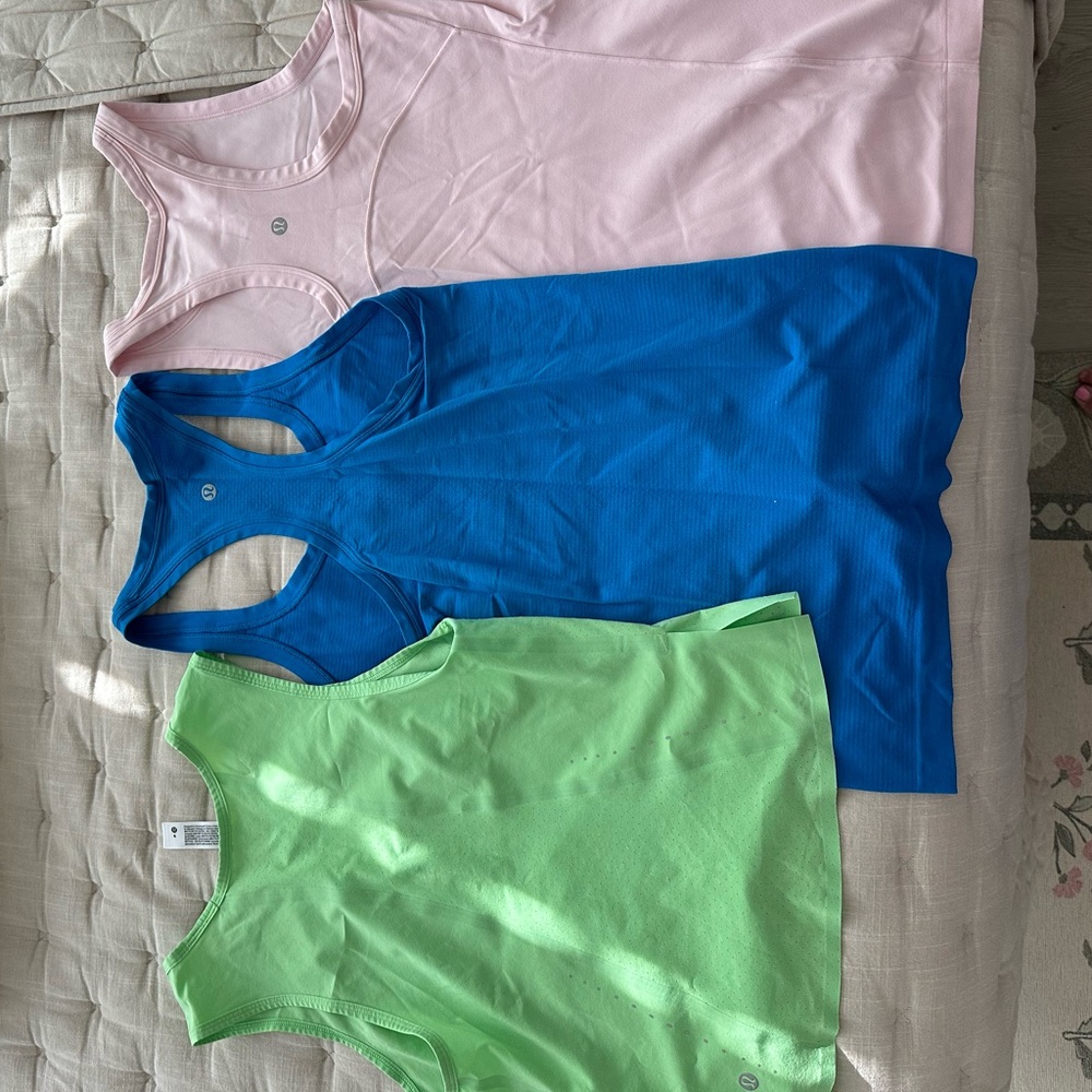3 Lululemon tank tops, size 4. $50 for all 3.
